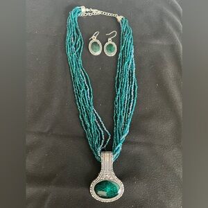 Multi-strand beaded necklace with removable pendant and earrings set